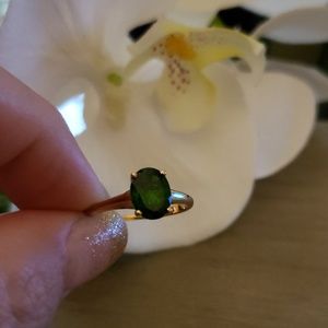 Size 7 1/2 Oval Emerald ring in 14kt yellow gold